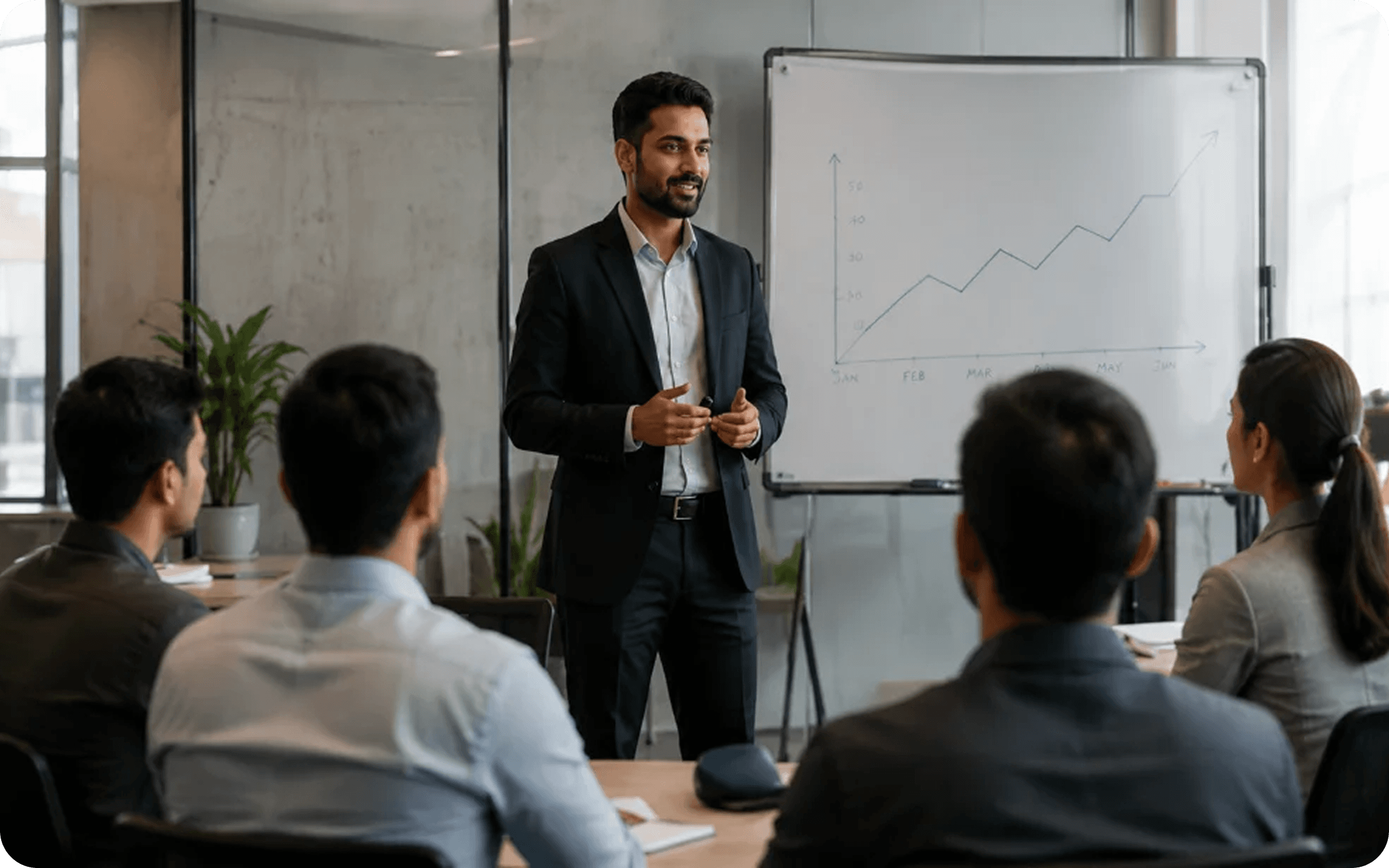 Trainer leading a workshop at a client office